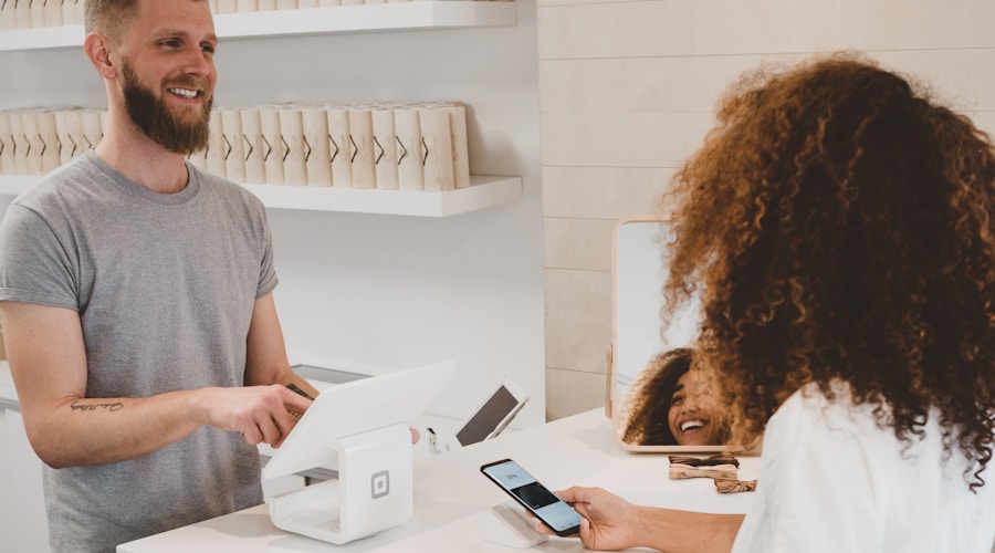 Small business owner at a modern retail storefront